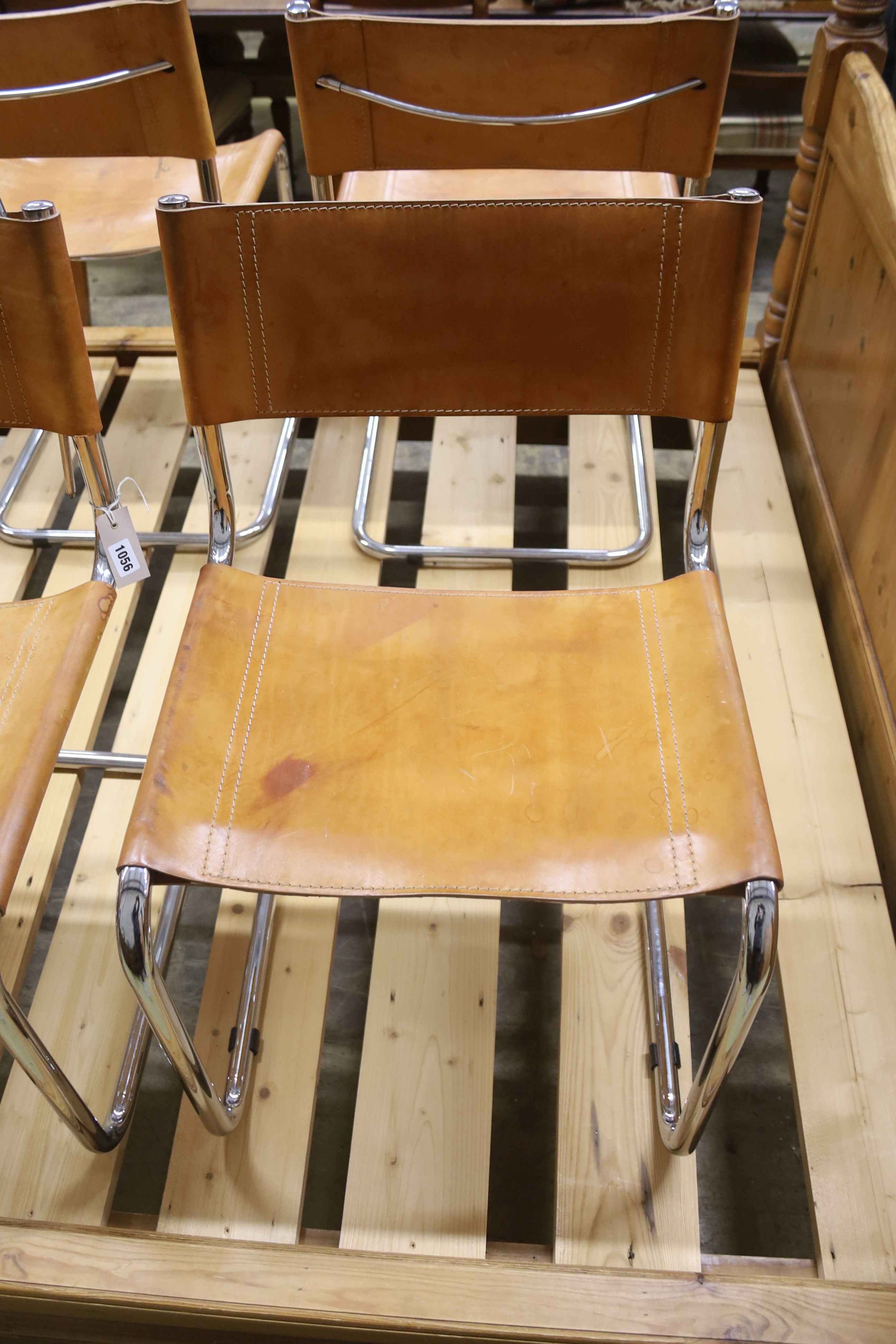 A set of six Italian design tan leather and chrome cantilever dining chairs, width 48cm, depth 44cm, height 77cm